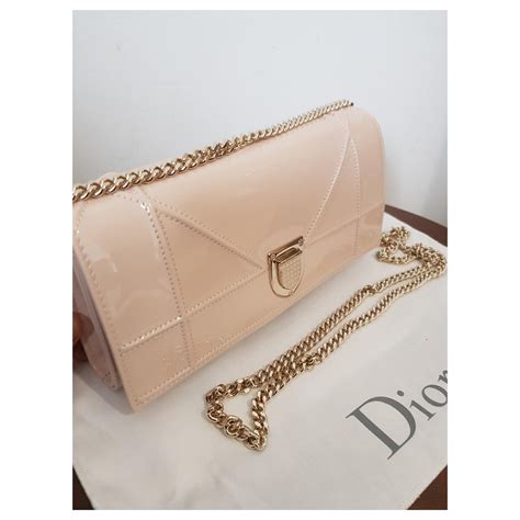 dior beige clutch